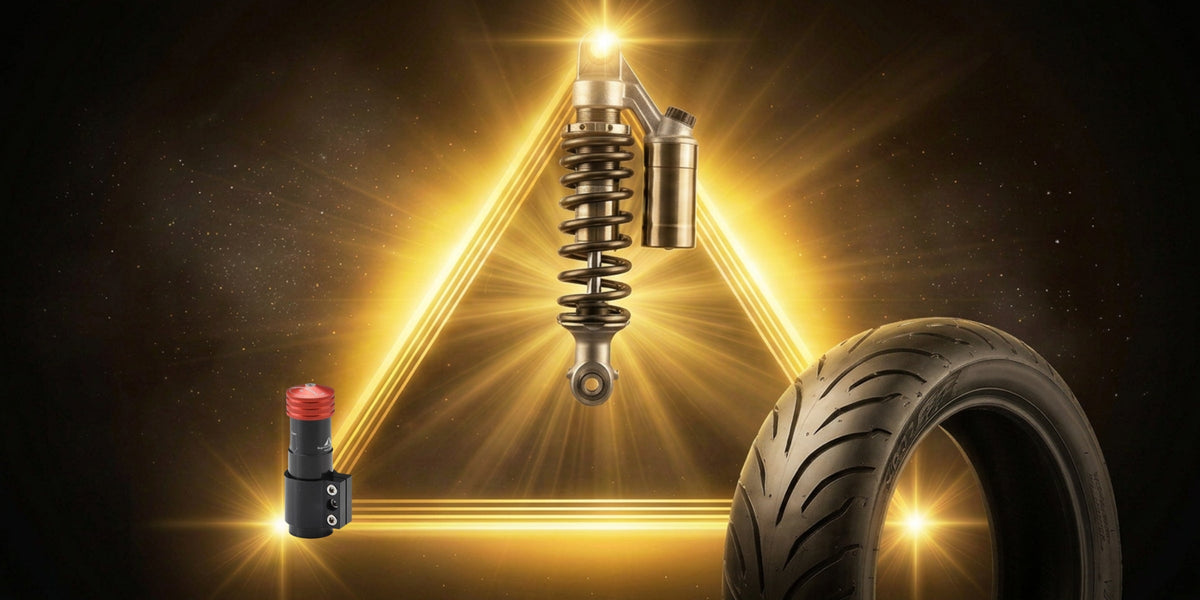 riángulo dorado con amortiguador, neumático y kit Oversuspension — los tres elementos de la trinidad perfecta del motociclismo